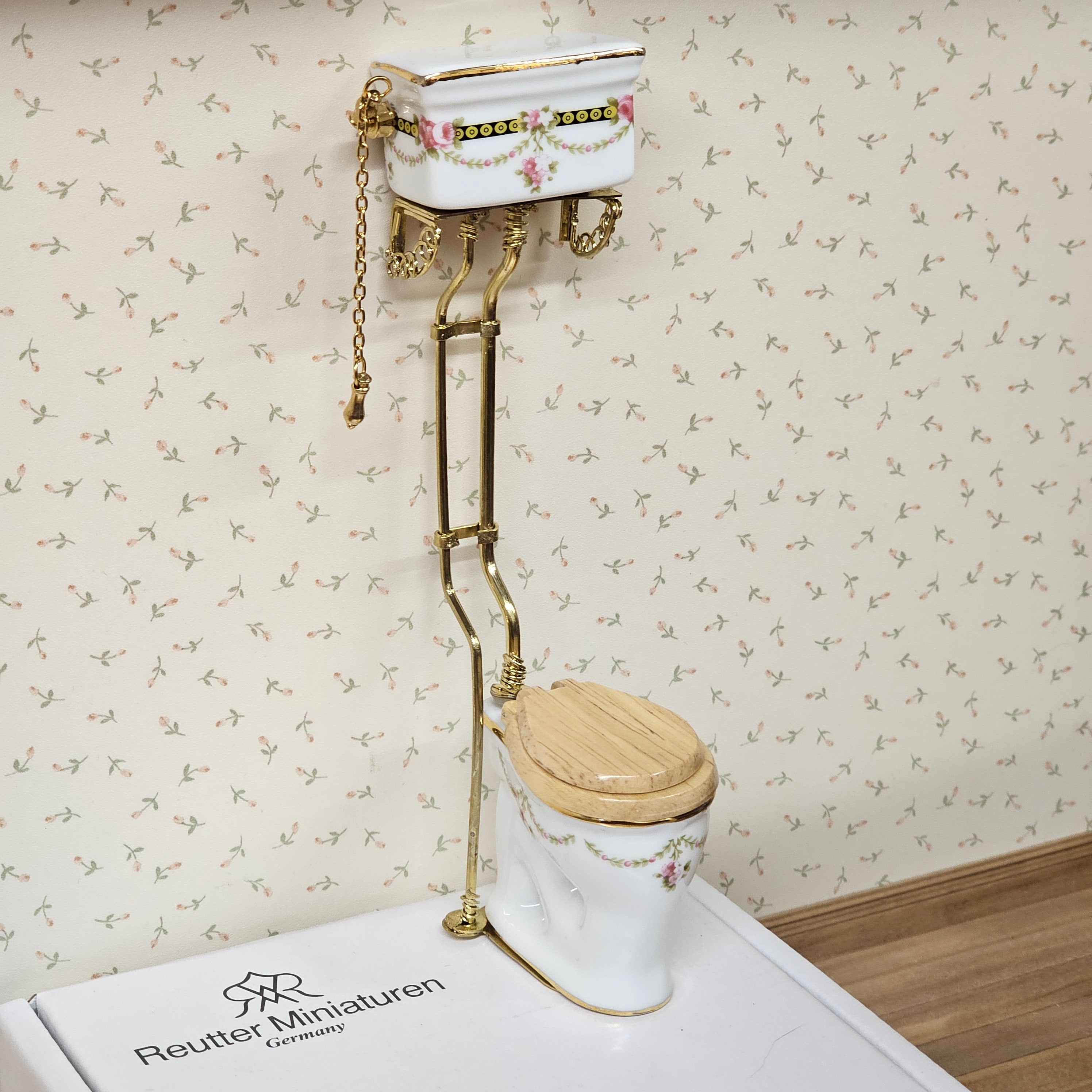 Hochtoilette heller Sitz