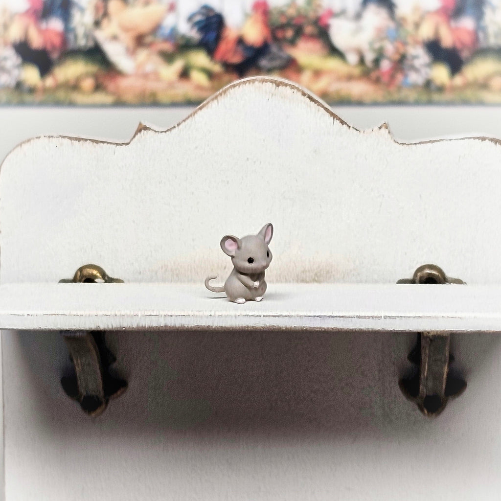 Maus sitzend