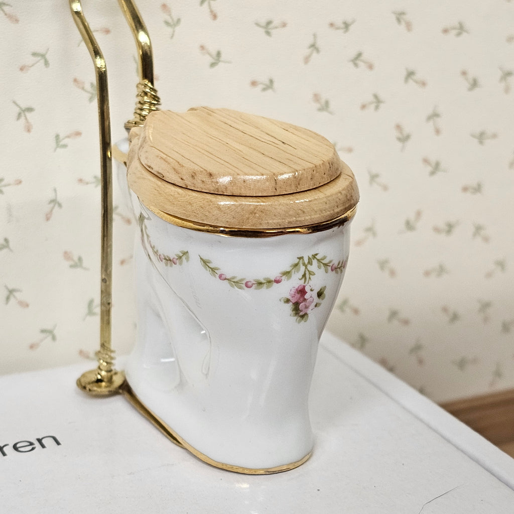 Hochtoilette heller Sitz