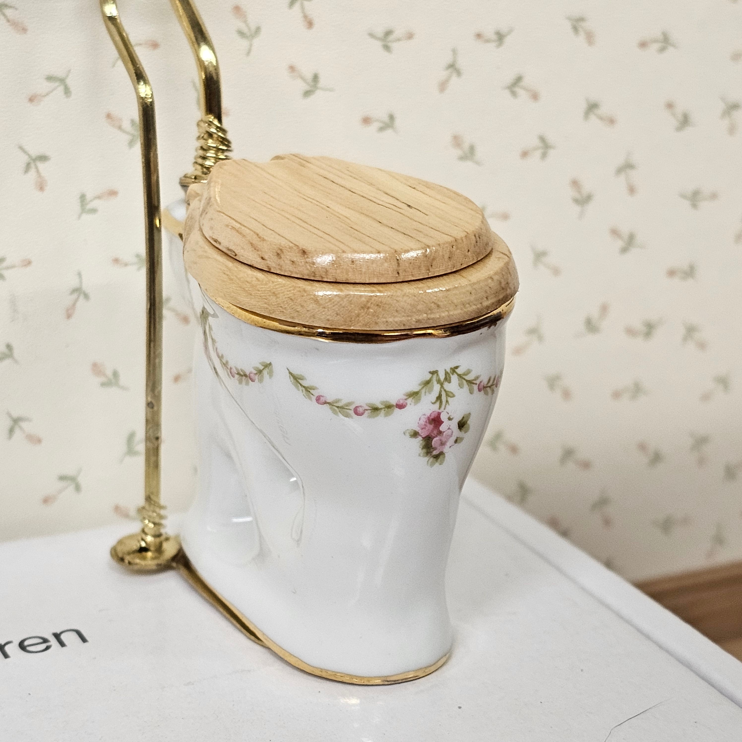 Hochtoilette heller Sitz